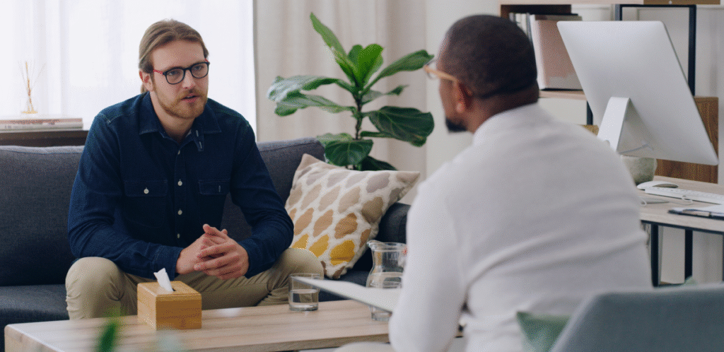 smiling young business man standing with crossed a 2022 10 05 17 30 46 utc background removed 2 2